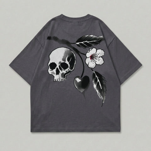 Dark grey t-shirt with skull, cherry, and flower graphic on back.