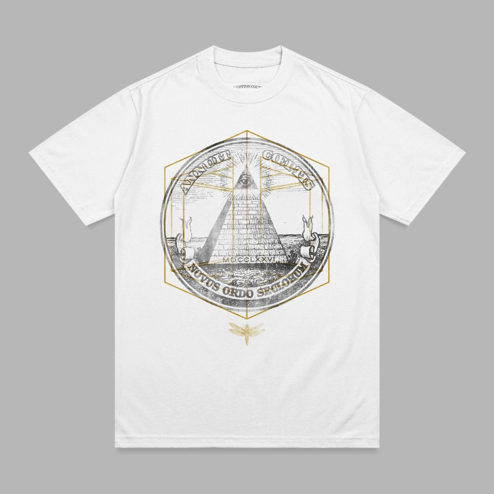 White t-shirt with gold pyramid and eye emblem, "Annuit Coeptis" and "Novus Ordo Seclorum" text.