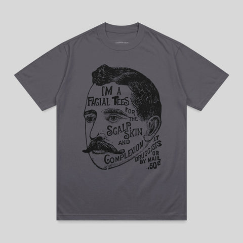 T-shirt with vintage illustration of a man's face advertising "Facial Tees".