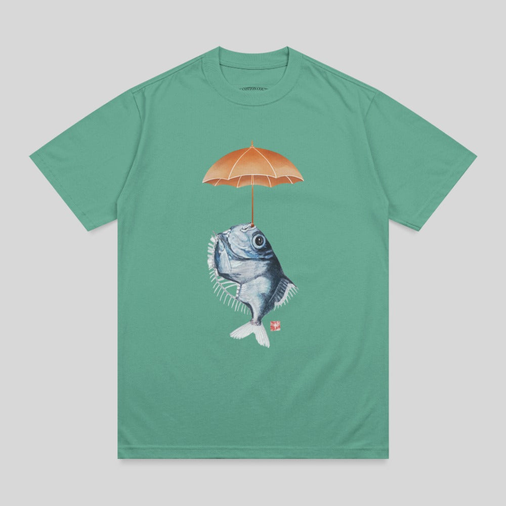 T-shirt with a fish holding an orange umbrella above its head.