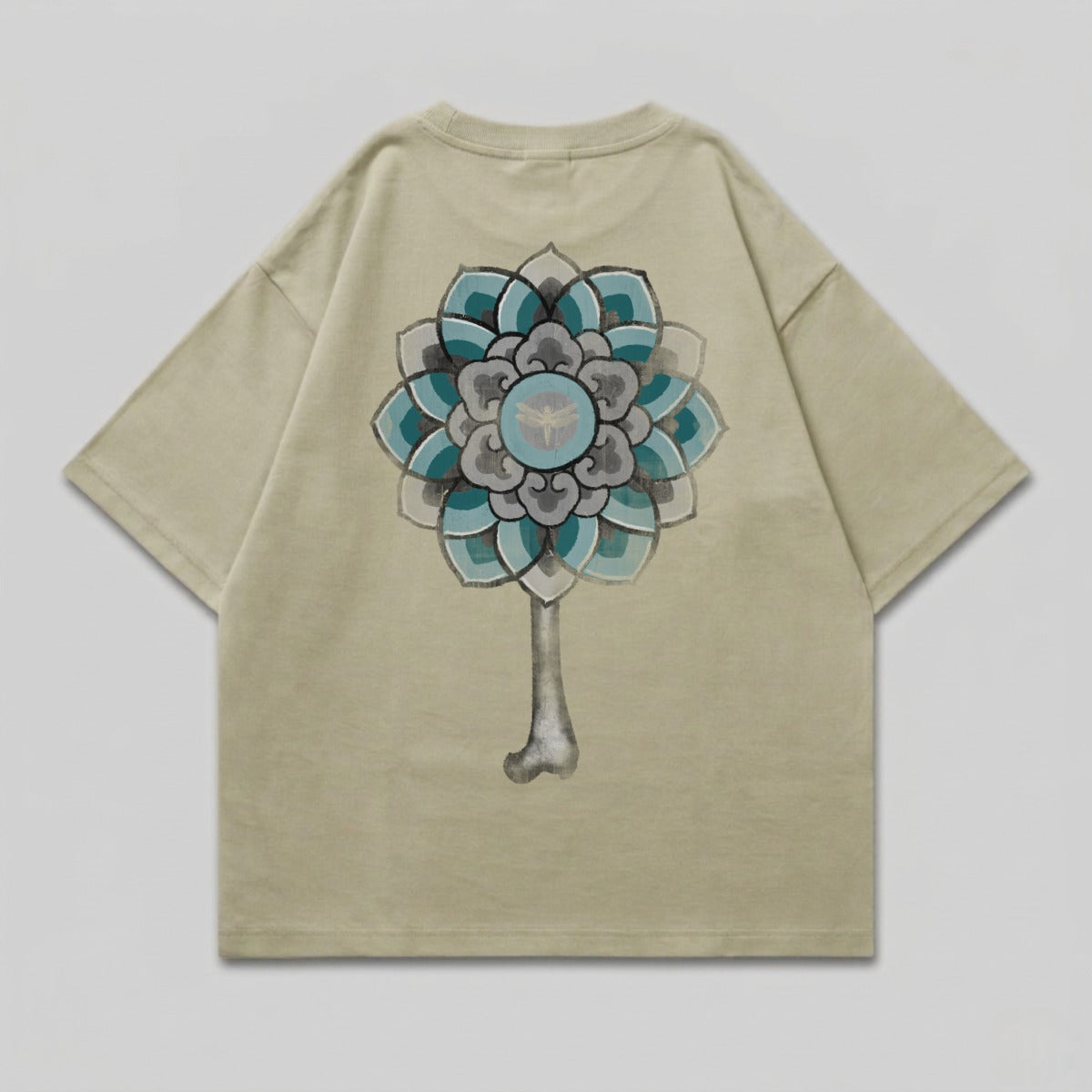Khaki t-shirt with a gray bone and blue, teal, and gray floral design.