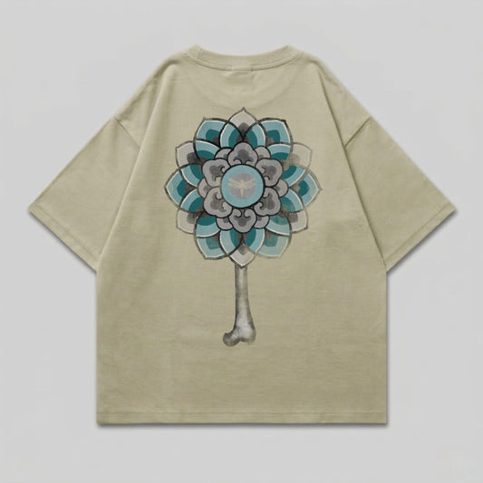 Khaki t-shirt with a gray bone and blue, teal, and gray floral design.