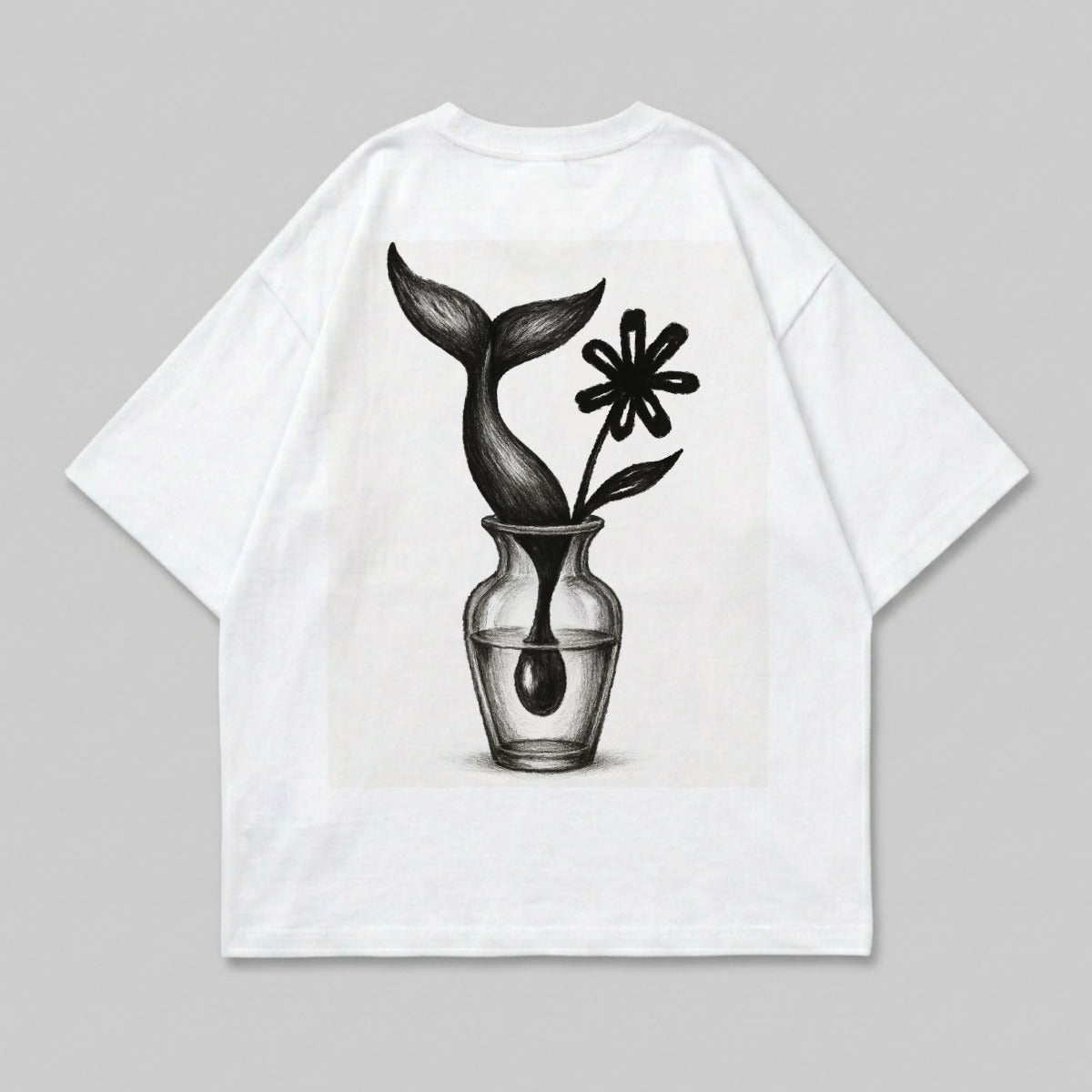 Whale tail and black flower in glass vase, graphic print on white t-shirt.