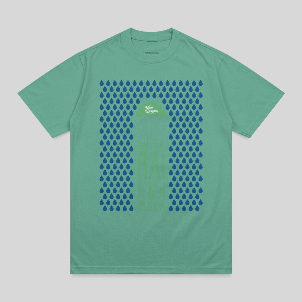 Green t-shirt with blue raindrops and text reading "You Make Me Sing".