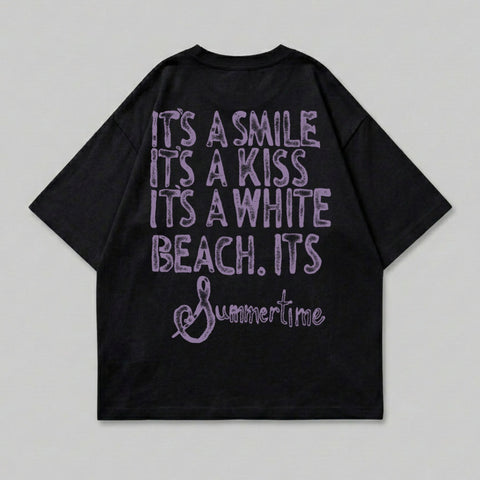 Black t-shirt with purple text "It's a smile, it's a kiss, it's a white beach. It's Summertime."