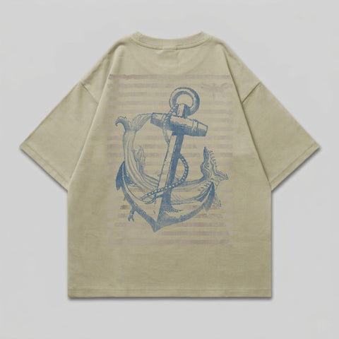 Beige t-shirt with blue anchor and striped design on back.