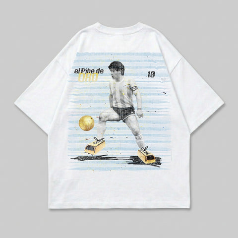 White t-shirt with graphic of Diego Maradona kicking a soccer ball.