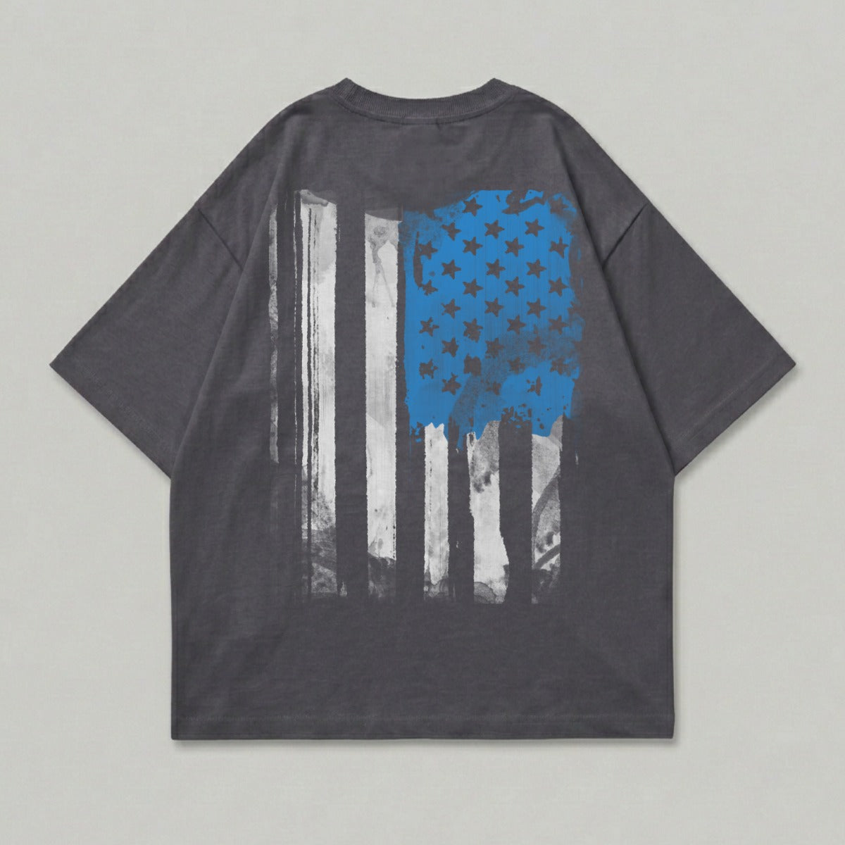 Gray t-shirt with distressed American flag graphic on the back.