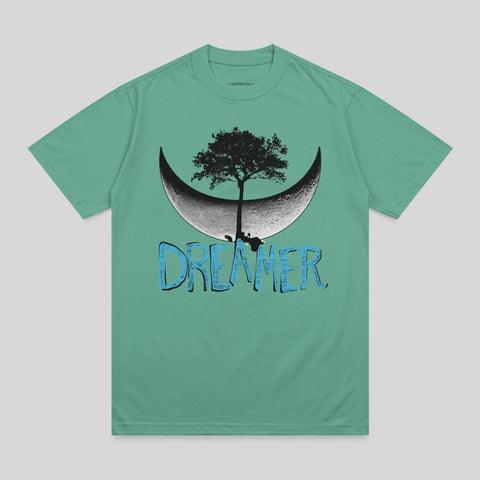 Teal t-shirt with a crescent moon, tree, and "DREAMER" text.