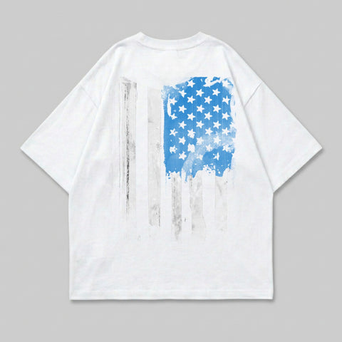 White t-shirt with distressed American flag graphic on the back.
