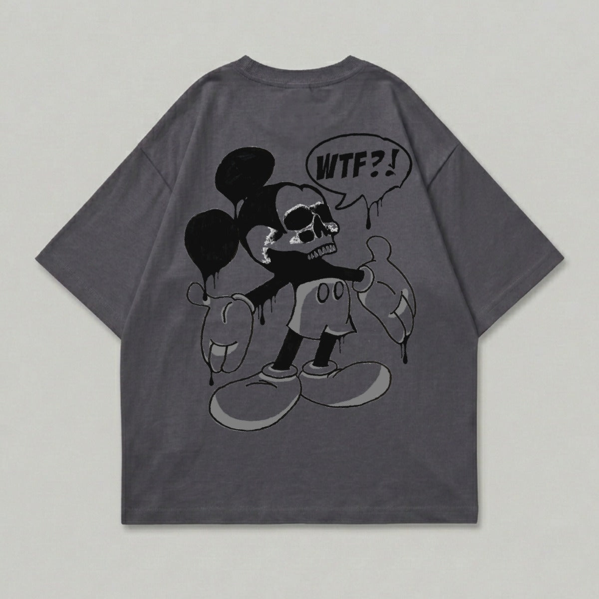 T-shirt featuring a cartoon character with skull face and "WTF?!" speech bubble.