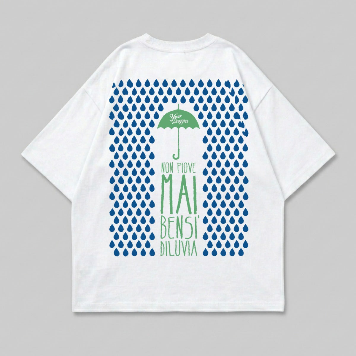 White t-shirt with blue raindrops and Italian text for "Never Rains".