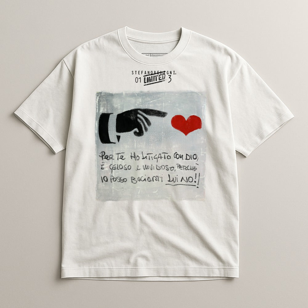 White t-shirt with a graphic of a hand pointing to a red heart and Italian text.