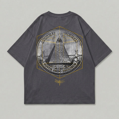 Dark grey t-shirt with eye pyramid and Latin text in gold circular design.