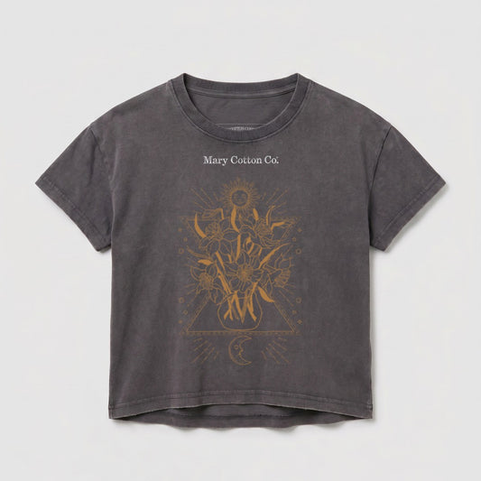 Gray t-shirt with celestial sun and floral design and "Mary Cotton Co." text.