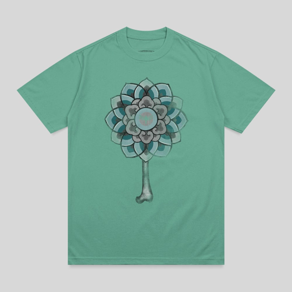 Teal t-shirt with a mandala design featuring a bone stem.