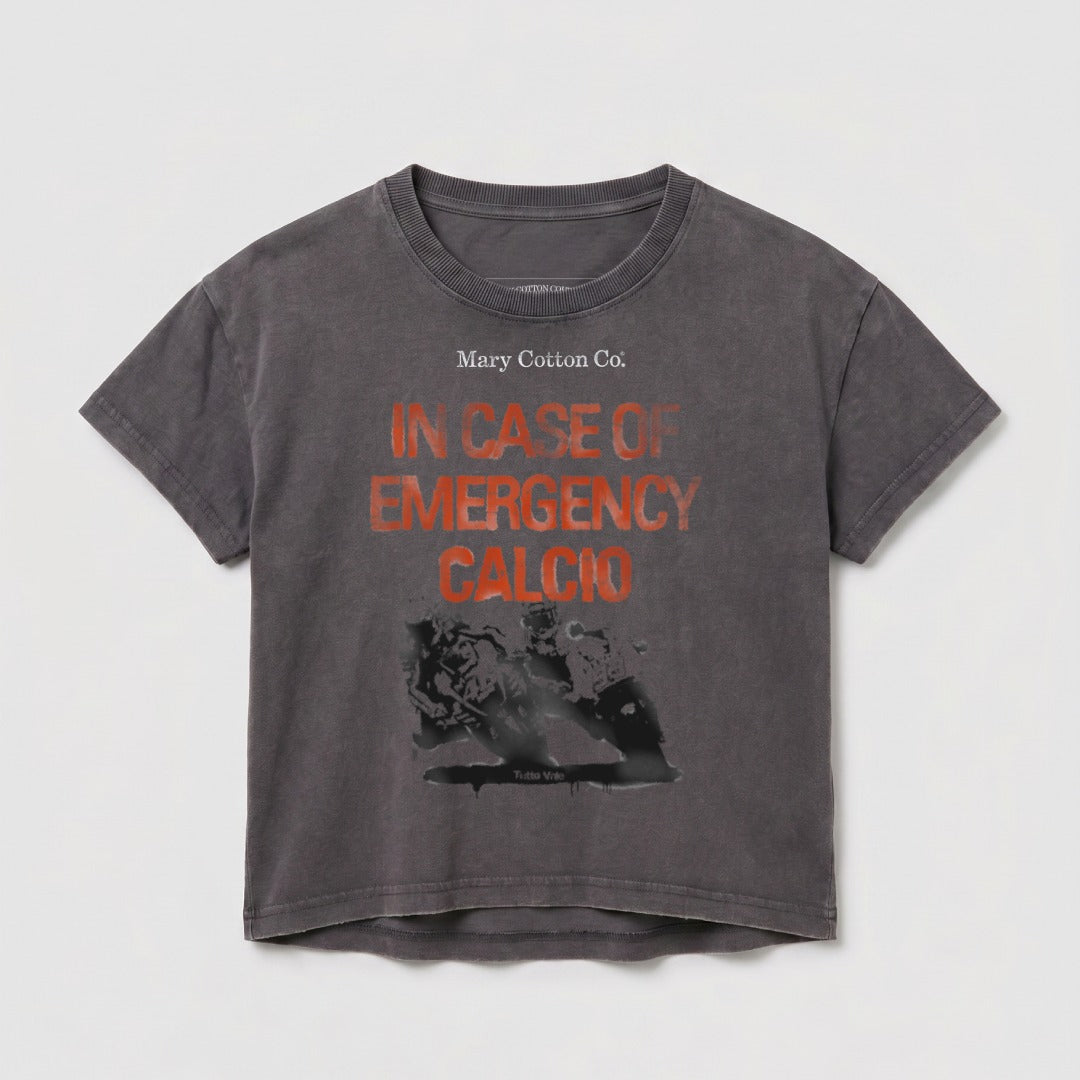 Grey t-shirt with "Mary Cotton Co. IN CASE OF EMERGENCY CALCIO" printed in orange.