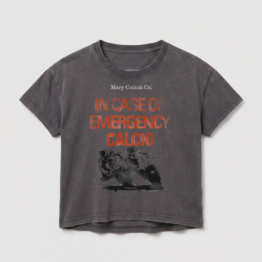 Grey t-shirt with "Mary Cotton Co. IN CASE OF EMERGENCY CALCIO" printed in orange.