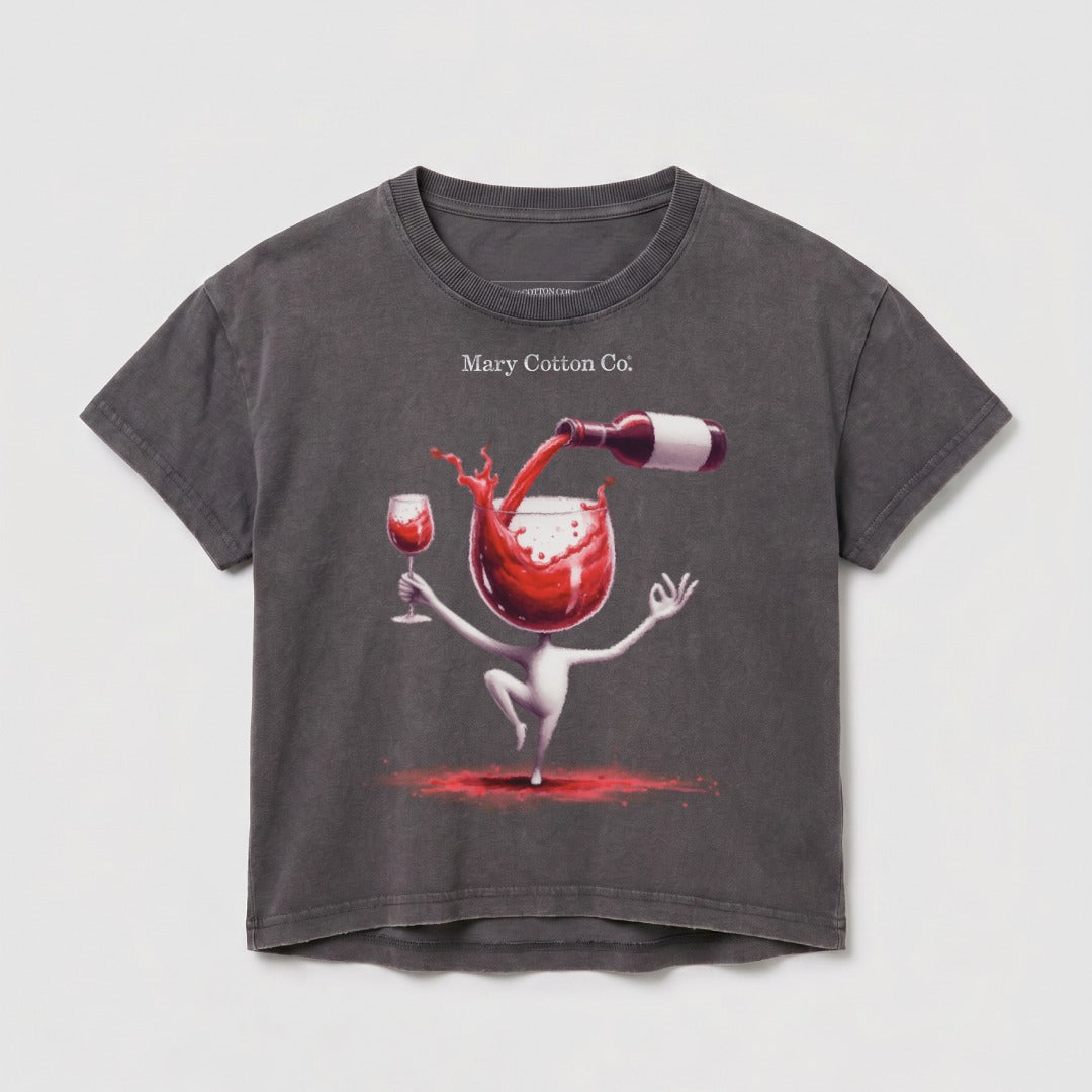 Dark gray t-shirt with a cartoon drawing of a figure pouring wine into a glass.