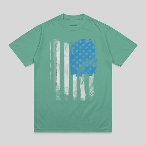 Green t-shirt with distressed blue stars and white stripes of an American flag.