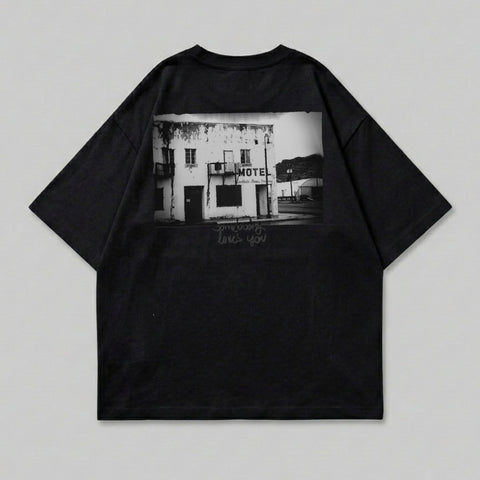 Black t-shirt with graphic of a rundown motel building.