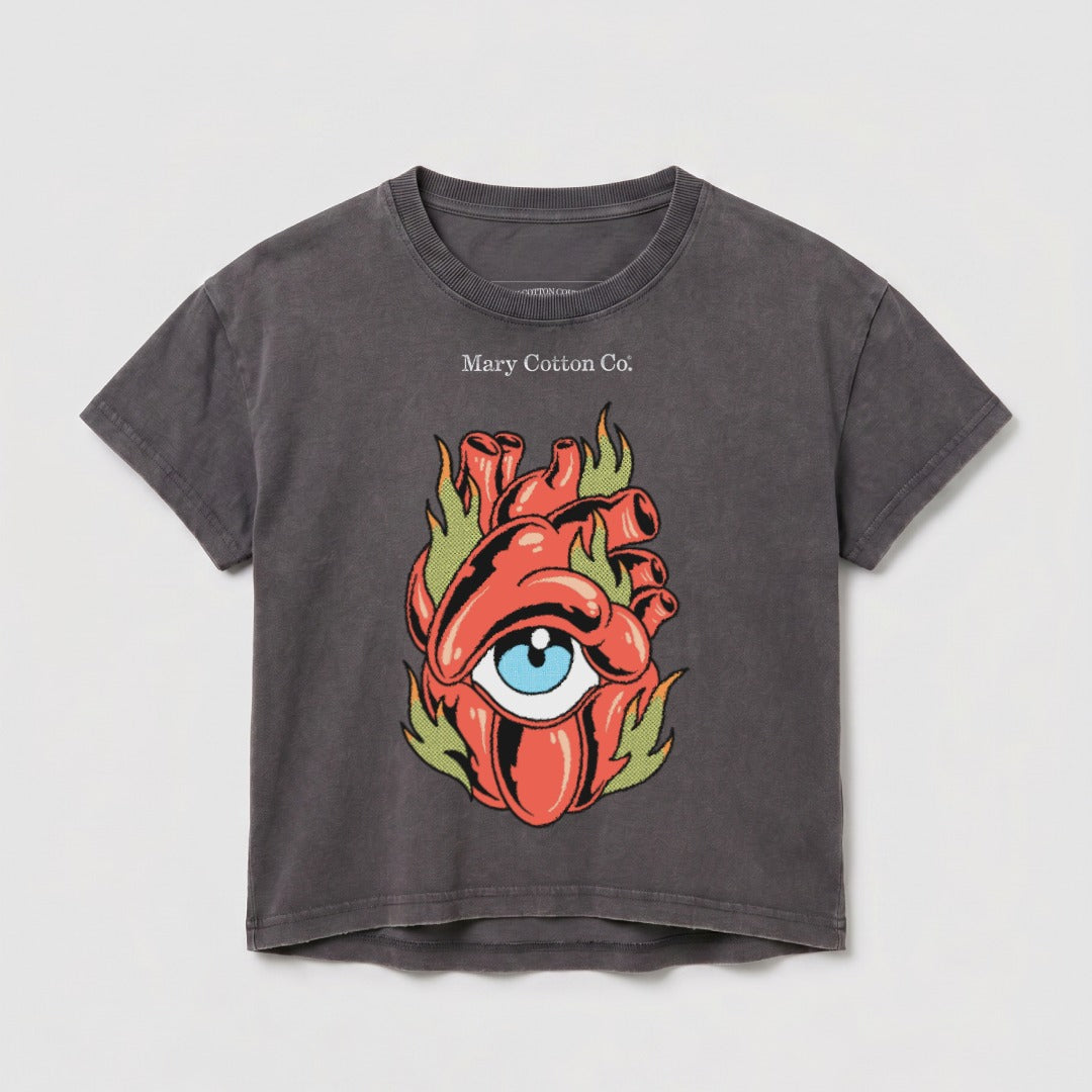 Dark gray t-shirt with a flaming heart eye graphic.