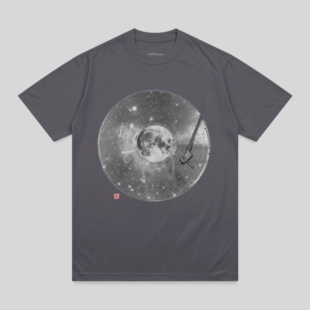 T-shirt with graphic of moon and stars on a record.