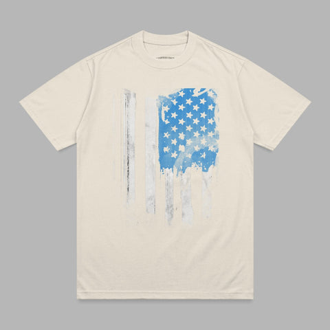 Cream t-shirt with distressed American flag graphic.