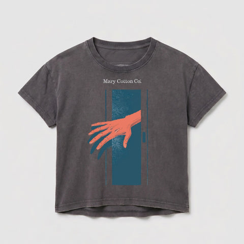 T-shirt with an orange hand reaching through a dark blue doorway.