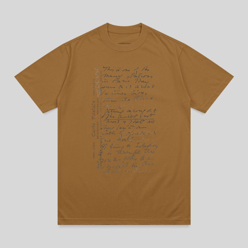 Brown t-shirt with handwritten script and "POST CARD" text.