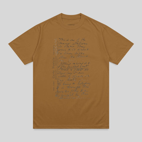 Brown t-shirt with handwritten script and "POST CARD" text.
