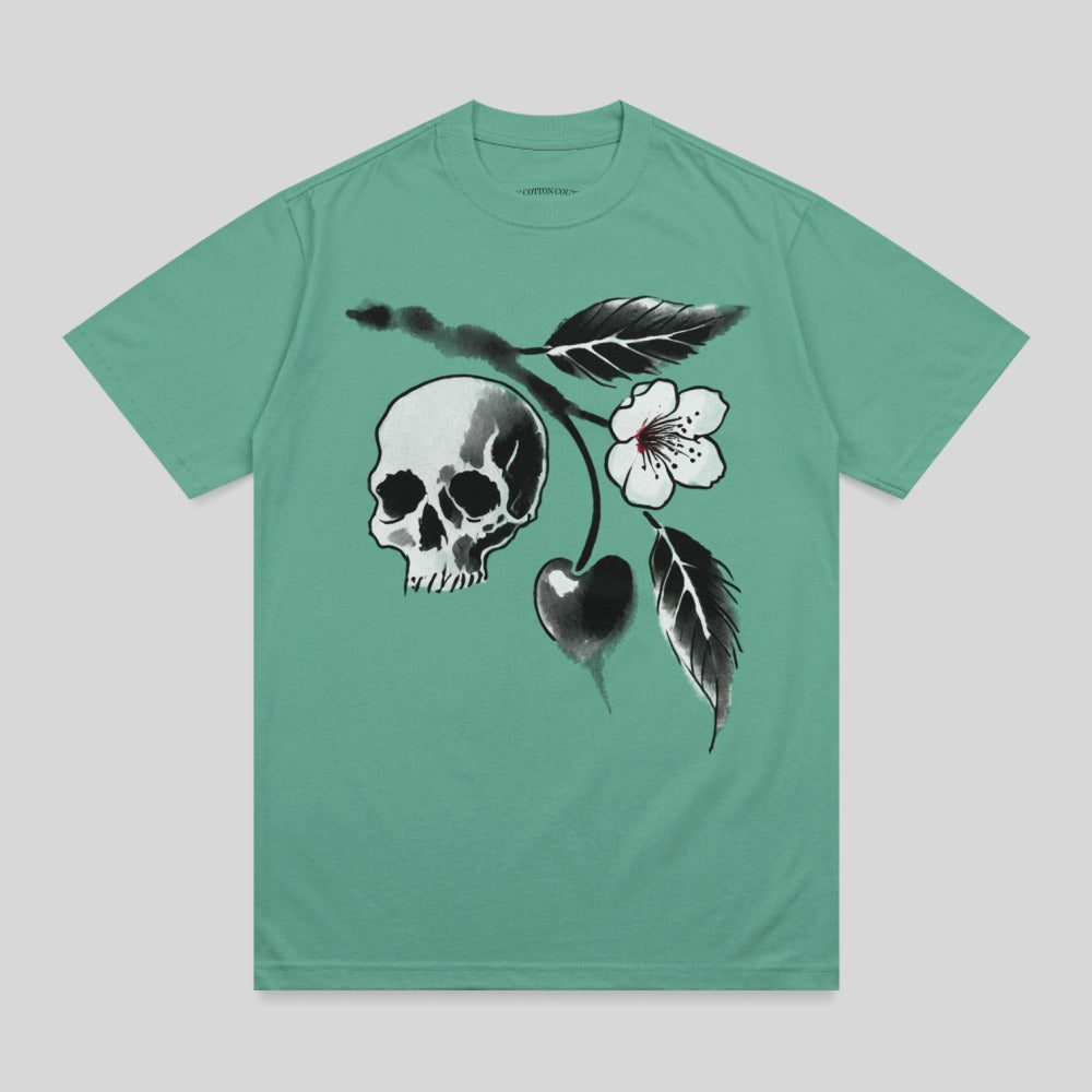 Teal t-shirt featuring a skull with cherry blossoms and leaves.