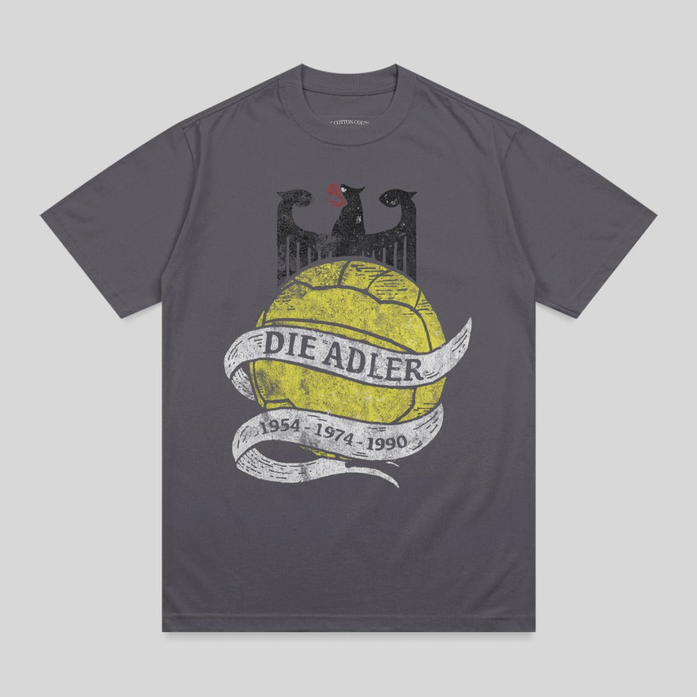 Grey t-shirt with yellow soccer ball, eagle, and text "DIE ADLER 1954-1974-1990".
