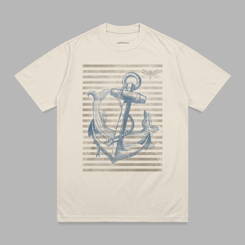 Anchor with dragonfly on striped t-shirt.