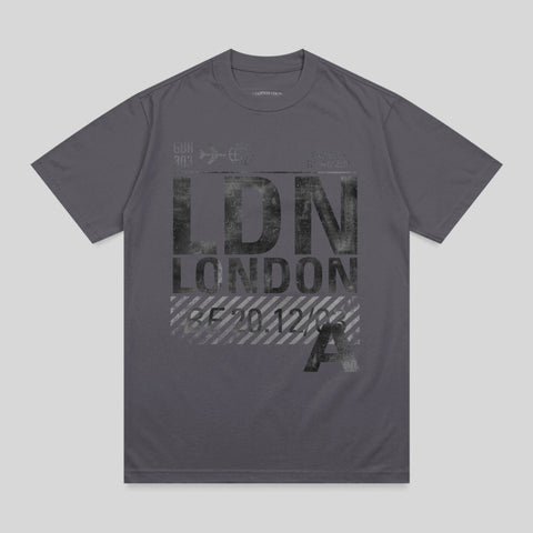 Gray t-shirt with "LDN LONDON" text and airport-style markings.