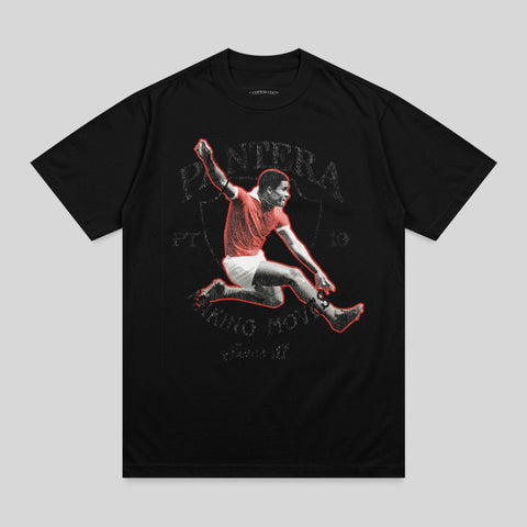 Black t-shirt with distressed graphic of a soccer player in red.