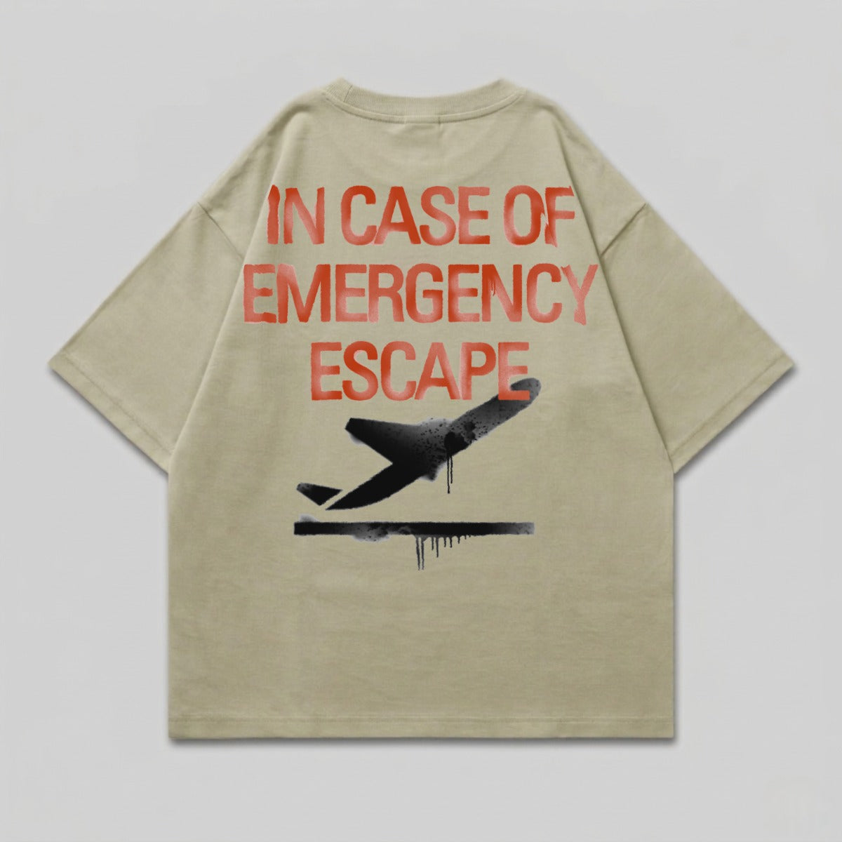 T-shirt with red "IN CASE OF EMERGENCY ESCAPE" text and black airplane graphic.