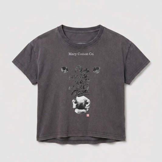 Dark grey t-shirt with a distressed graphic of a cow's face and text.