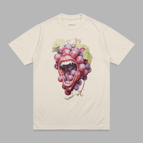 Cream t-shirt with graphic of screaming mouth emerging from bunch of grapes.