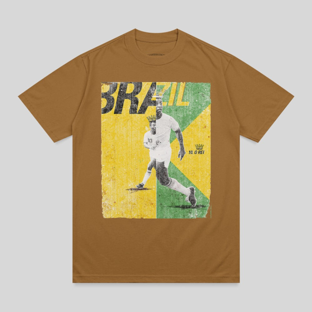Brown t-shirt with graphic of football player Pelé running, "BRAZIL" text.