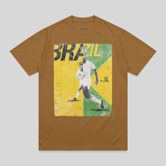 Brown t-shirt with graphic of football player Pelé running, "BRAZIL" text.