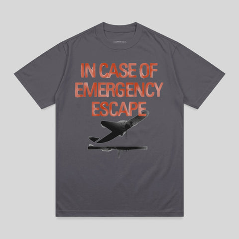 T-shirt with "In Case of Emergency Escape" text and a plane taking off.