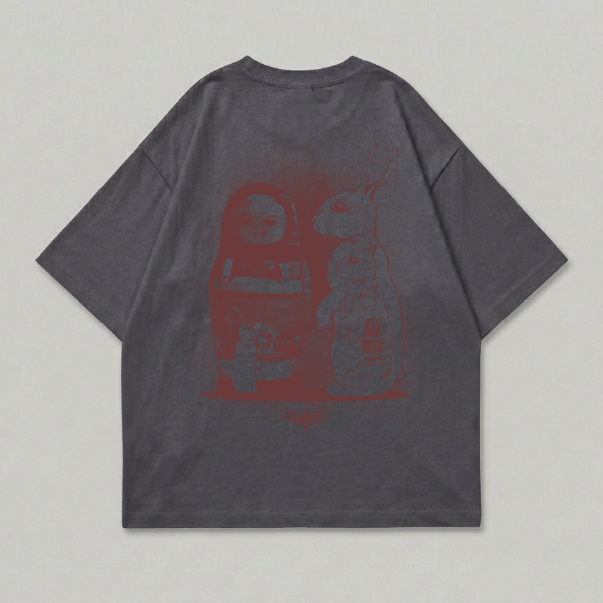 Grey t-shirt with red graphic of a matryoshka doll and a rabbit.