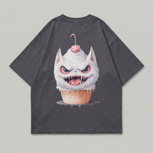 Dark grey t-shirt with a monstrous cupcake graphic and a cherry on top.