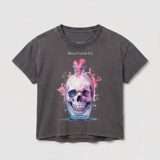 Dark gray t-shirt with graphic of a skull in a glass bottle with pink heart.