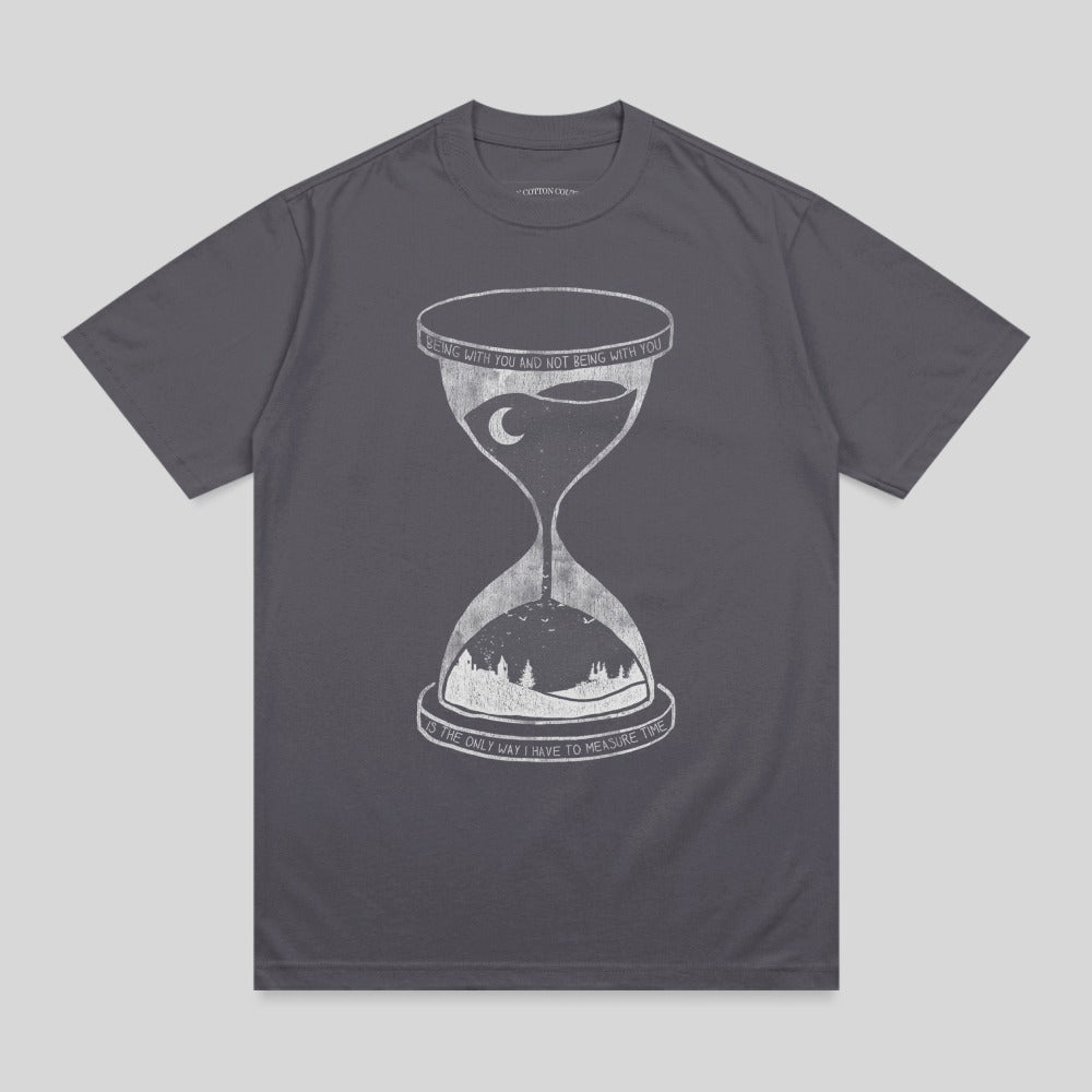 Dark grey t-shirt with hourglass and moon design, featuring text.
