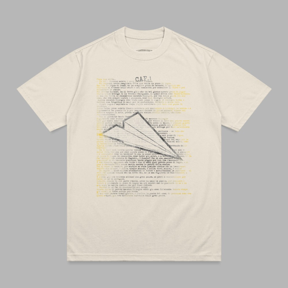 T-shirt with a cream background and a dense block of Italian text.