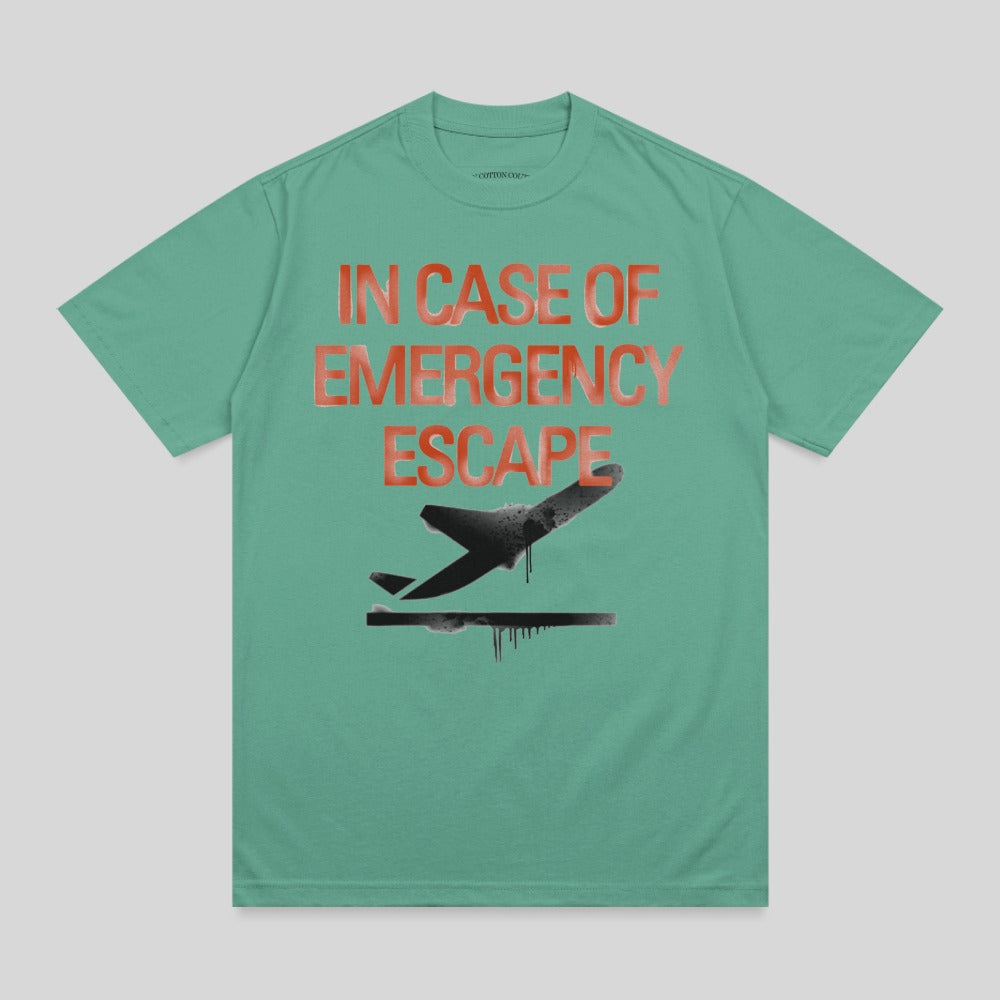 Teal t-shirt with orange "In Case of Emergency Escape" text and airplane graphic.