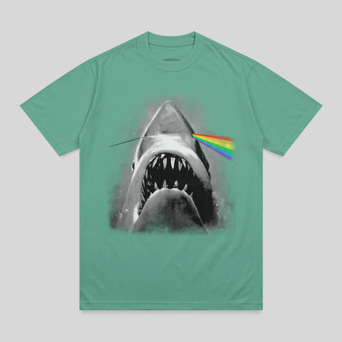Shark with rainbow prism light beam through its head.