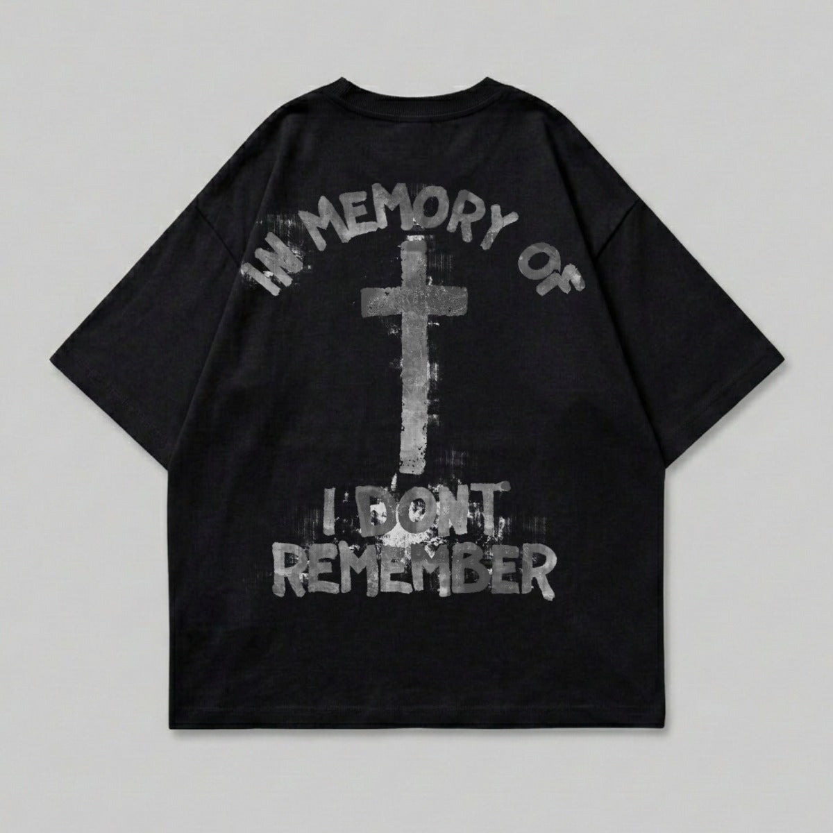 Black t-shirt with white graphic of a cross and text "IN MEMORY OF I DON'T REMEMBER".
